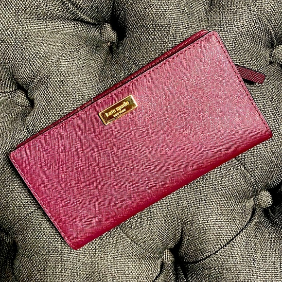 kate spade Handbags - Kate Spade Plum Color Wallet EUC
